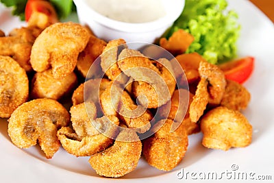 Deep-fried champignon mushrooms Stock Photo