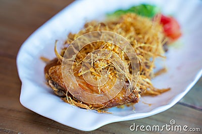 Deep fried chicken with lemon grass Stock Photo