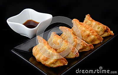 Deep fried gyoza crispy and golden colour. Stock Photo