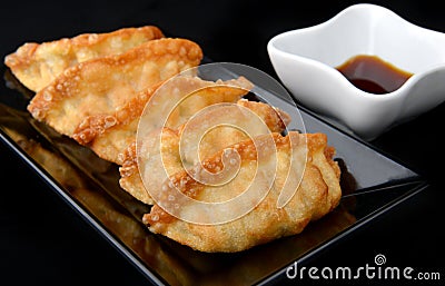 Deep fried gyoza crispy and golden colour. Stock Photo