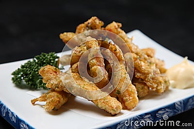 Deep fried pork innards with parsley Stock Photo