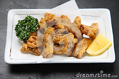 Deep fried pork innards with parsley Stock Photo