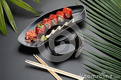 Deep-fried prawns, avocado, mayonnaise and tobiko sushi Stock Photo