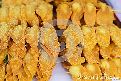 Deep fried wonton`s on a stick Stock Photo