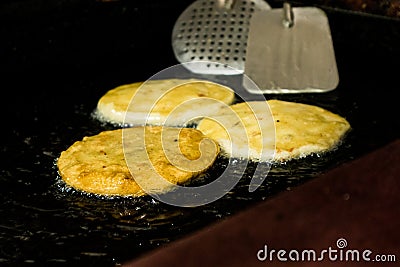 Deep Frying Traditional Gorditas in Mexico City Stock Photo