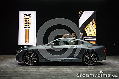 Deep mat grey Polestar exhibition model with potential buyers. Editorial Stock Photo