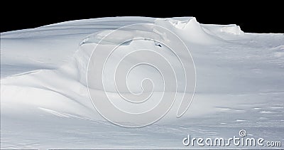 Deep snow drift isolated on black Stock Photo