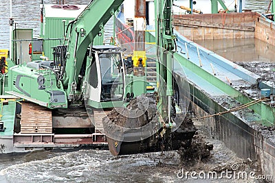 Deepening the fairway on a river Stock Photo