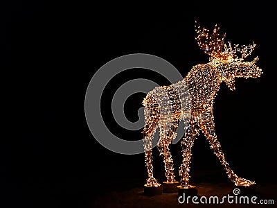 Deer glowing in the dark, decoration outside Stock Photo