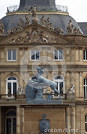 Deer sculpture with crest in front of the main entrance of the New Castle Neues Schloss in Germany, Stuttgart Stock Photo
