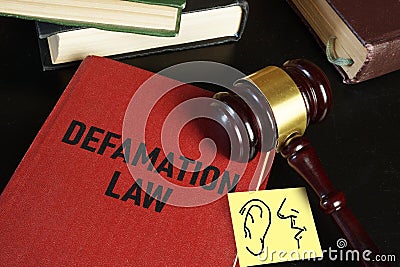 Defamation law is shown using the text Stock Photo