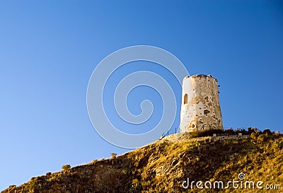 Defensive tower at sunset Stock Photo