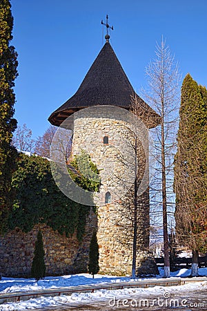 Defensive tower and walls at a medieval monastery Stock Photo