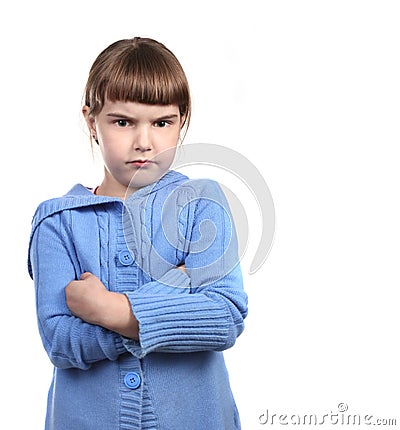 Defiant Young Child With Arms Crossed Stock Photo