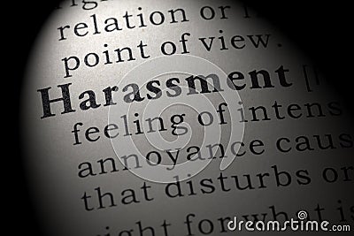 Definition of harassment Stock Photo