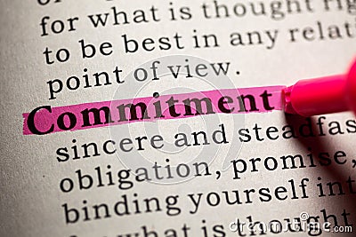 Definition of the word commitment Stock Photo