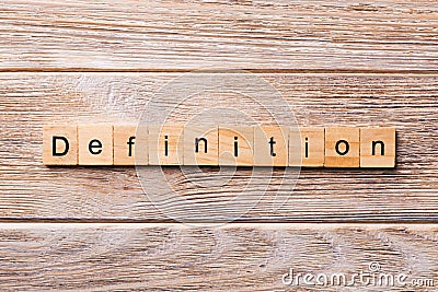 Definition word written on wood block. Definition text on wooden table for your desing, concept Stock Photo