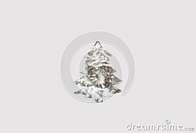 Defocus abstract paper christmas tree shaped on gray background. Art Christmas tree paper cutting design simple card Stock Photo