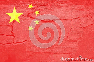 Defocus China flag, official colors and proportion correctly. National China flag. Stone wall background. Crack Stock Photo