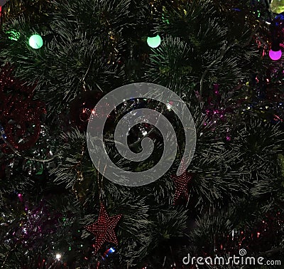 defocus christmas tree with ball ornament and small light on it Stock Photo