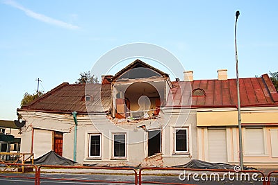 Defocus huge ruins, wreck in Ukraine, war. House after russian attack. Ruined home background. Kyiv home. Close-up Editorial Stock Photo