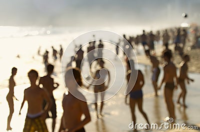 Defocus Silhouettes of Carioca Brazilians Ipanema Beach Sunset Stock Photo