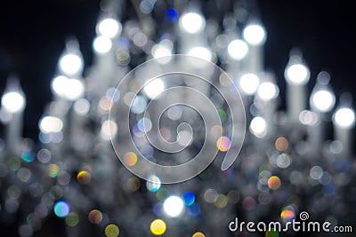 Defocused lights of chandelier, blurred light fixture background Stock Photo