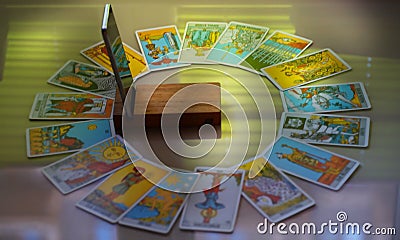 Defocused mystic ritual with tarot cards, and candles. Editorial Stock Photo