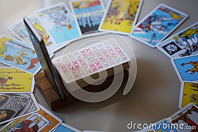 Defocused mystic ritual with tarot cards, and candles. Editorial Stock Photo