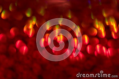 Defocused Red glitter lights background. Blurred Bokeh Christmas Stock Photo