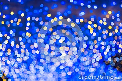 Defocused urban abstract texture, bokeh lights of city lights in Stock Photo