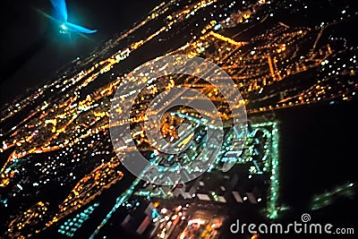 Dark background view of city with lights from aeroplane. Night lights in the city Stock Photo