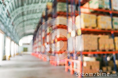 Defocused warehouse racks with cartons boxes as background Stock Photo