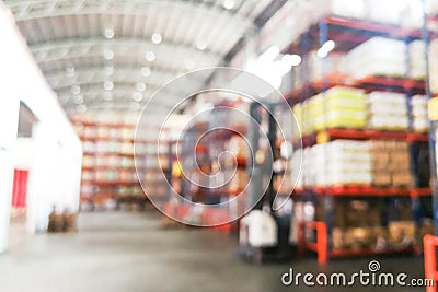 Defocused warehouse racks with cartons boxes as background Stock Photo