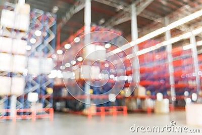 Defocused warehouse racks with cartons boxes as background Stock Photo