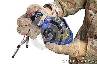 defused improvised explosive device (IED) in hand Stock Photo