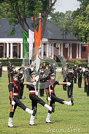 IMA passing out parade cadets marching with flags. Editorial Stock Photo