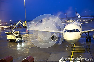 Deicing of the Lufthansa plane Editorial Stock Photo