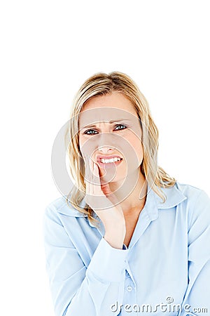 Dejected businesswoman with toothache Stock Photo