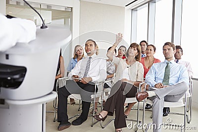 Delegate Asking Question At Business Conference Stock Photo