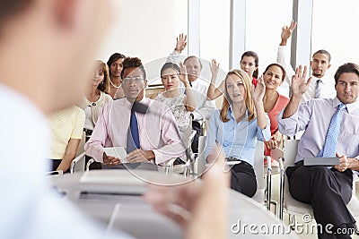 Delegates Asking Question At Business Conference Stock Photo