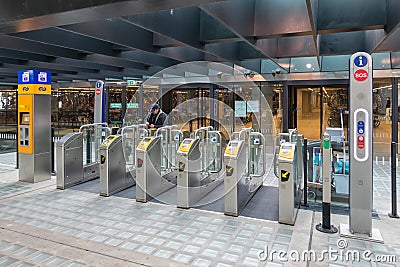 Chip gates at Delft central station for entrance railway platforms Editorial Stock Photo