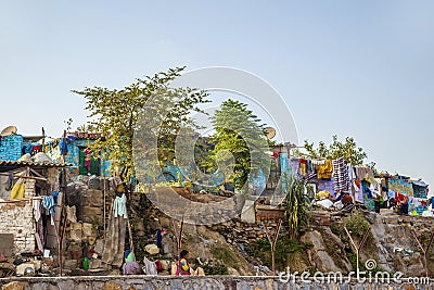 People live in the poor area in Delhi, India. A household survey 2009 in slum areas shows that only just over half the children Editorial Stock Photo