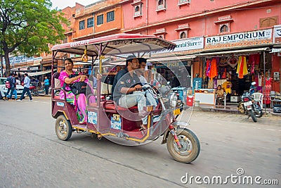 DELHI, INDIA - SEPTEMBER 19, 2017: Autorickshaw pink in the street, paharganj, there are many tourist stay in this area Editorial Stock Photo