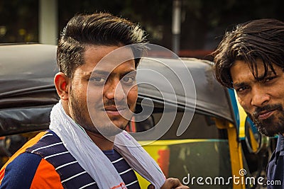 Delhi, India - March 19, 2019 : Indian auto rickshaw three wheeler tempo, taxi driver man Editorial Stock Photo