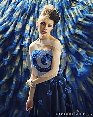 Delicate brunette woman over the fancy background Stock Photo