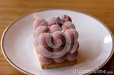 Delicate Pink velours Moose cakes in the shape of a cube of balls Stock Photo