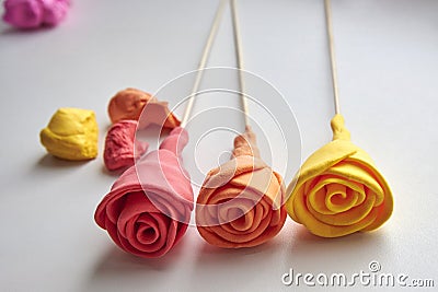 Delicate roses made of super light airy colored plasticine Stock Photo