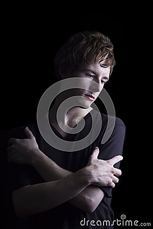 Delicate and vulnerable young man Stock Photo