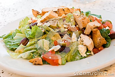 Delicatessen caesar salad with smoked turkey Stock Photo